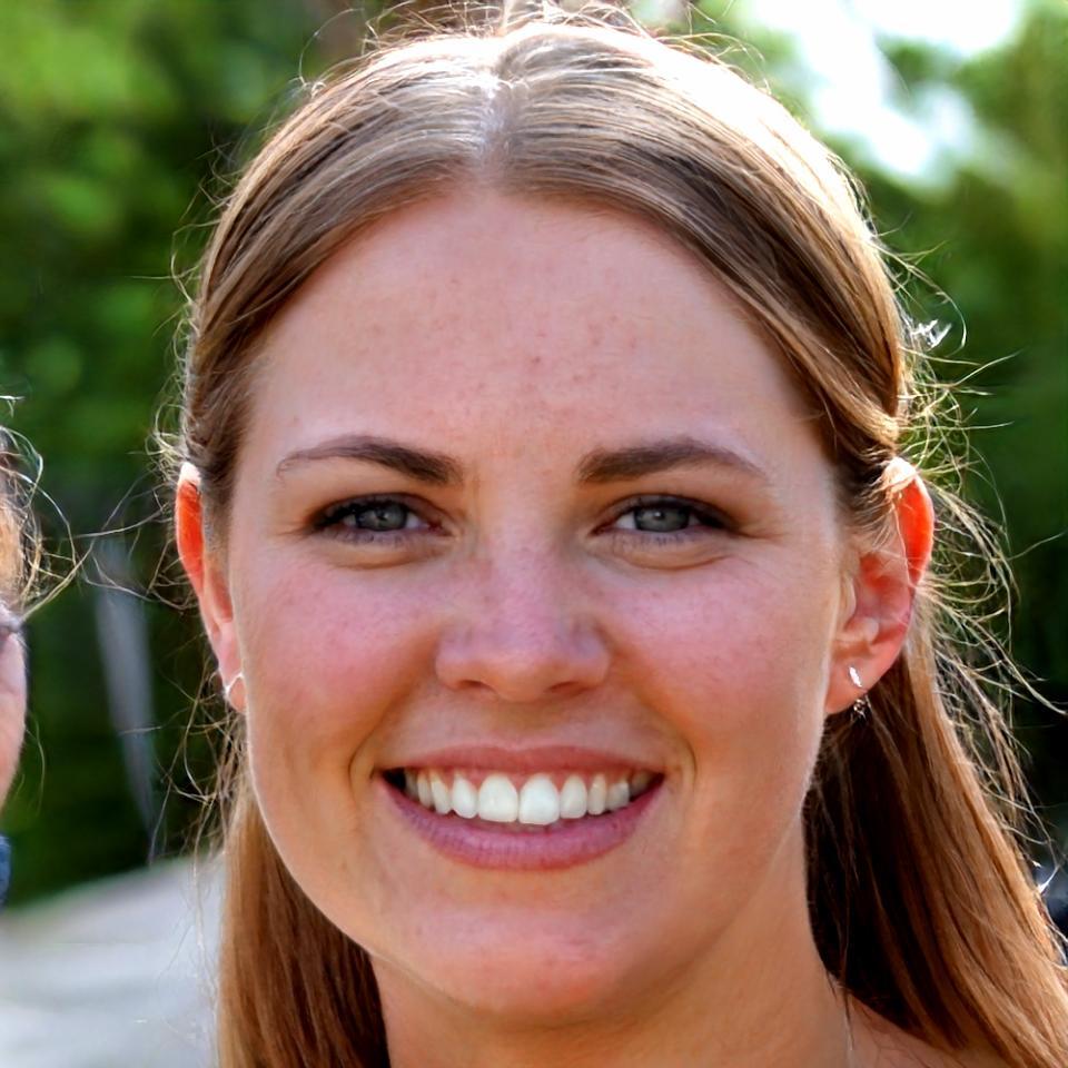 Professional headshot of Elena Kowalski