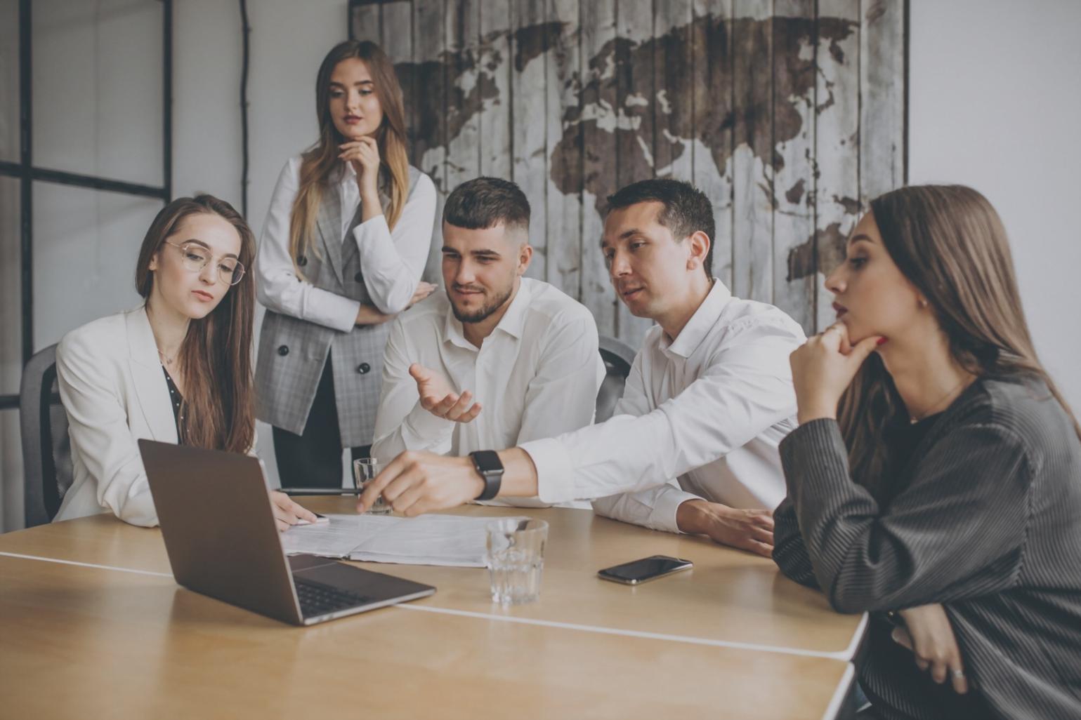 Business professional analyzing automation workflows on computer screen